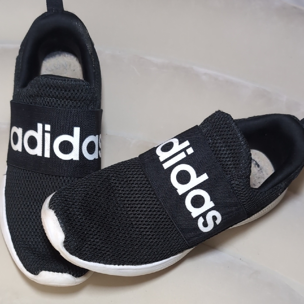 Adidas Black and White Slip-On Sneakers